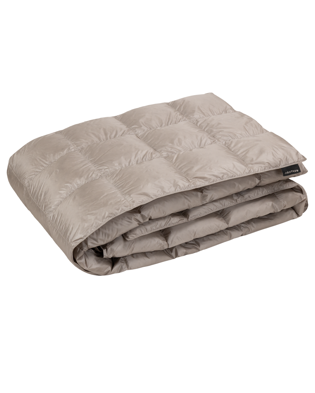 Henkäys-untuvapäiväpeitto on viikattu ja sen pinta on tikattu ruutukuviolla. Peiton väri on beige (väri: simpukka).